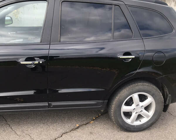 Чорний Хендай Санта Фе, об'ємом двигуна 2.2 л та пробігом 317 тис. км за 8900 $, фото 2 на Automoto.ua