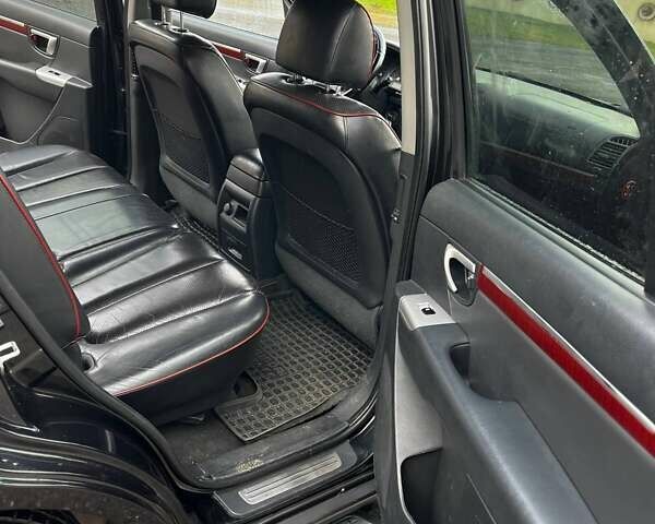 Черный Хендай Санта Фе, объемом двигателя 2.19 л и пробегом 220 тыс. км за 12000 $, фото 12 на Automoto.ua