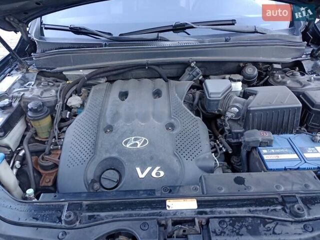 Черный Хендай Санта Фе, объемом двигателя 2.7 л и пробегом 283 тыс. км за 9500 $, фото 18 на Automoto.ua