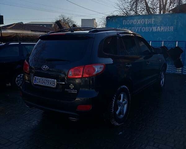 Черный Хендай Санта Фе, объемом двигателя 2.7 л и пробегом 283 тыс. км за 9500 $, фото 6 на Automoto.ua