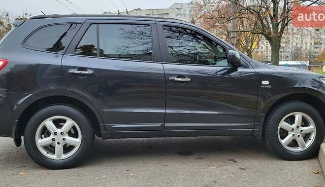 Черный Хендай Санта Фе, объемом двигателя 2.7 л и пробегом 182 тыс. км за 10000 $, фото 1 на Automoto.ua