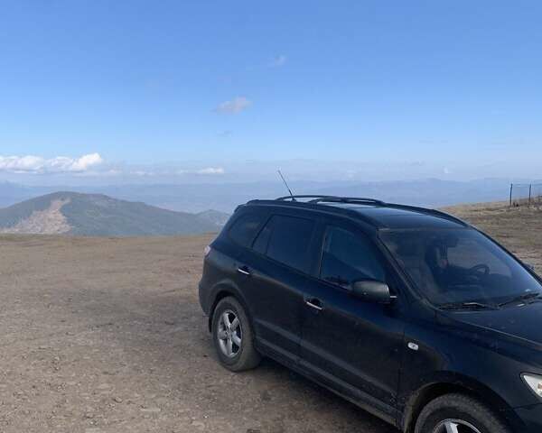 Черный Хендай Санта Фе, объемом двигателя 2.19 л и пробегом 220 тыс. км за 10000 $, фото 10 на Automoto.ua