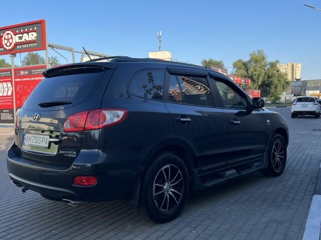Черный Хендай Санта Фе, объемом двигателя 2.7 л и пробегом 112 тыс. км за 10300 $, фото 3 на Automoto.ua