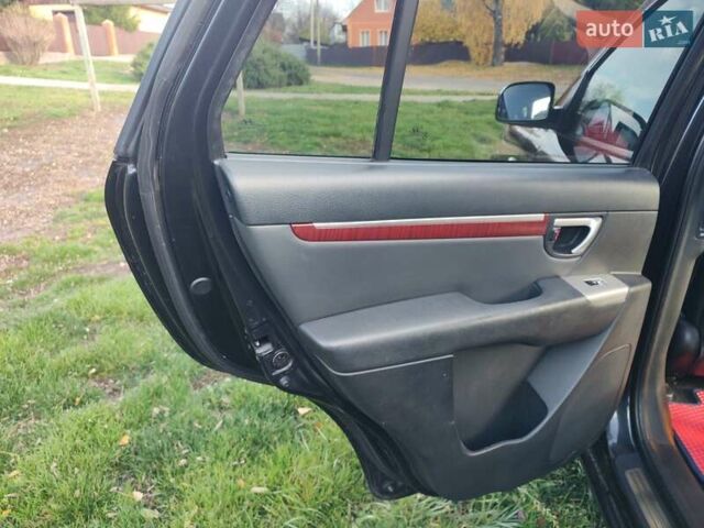 Черный Хендай Санта Фе, объемом двигателя 2.19 л и пробегом 181 тыс. км за 11000 $, фото 27 на Automoto.ua