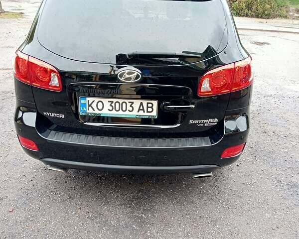 Черный Хендай Санта Фе, объемом двигателя 2.7 л и пробегом 152 тыс. км за 10500 $, фото 3 на Automoto.ua