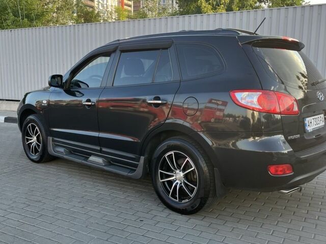 Черный Хендай Санта Фе, объемом двигателя 2.7 л и пробегом 112 тыс. км за 10300 $, фото 4 на Automoto.ua