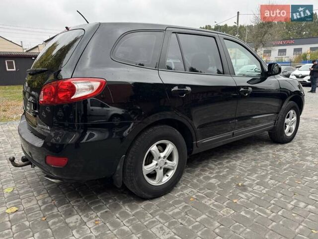 Черный Хендай Санта Фе, объемом двигателя 2.7 л и пробегом 361 тыс. км за 8300 $, фото 15 на Automoto.ua