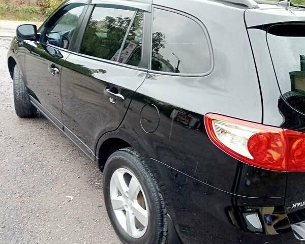 Черный Хендай Санта Фе, объемом двигателя 2.7 л и пробегом 152 тыс. км за 10500 $, фото 2 на Automoto.ua