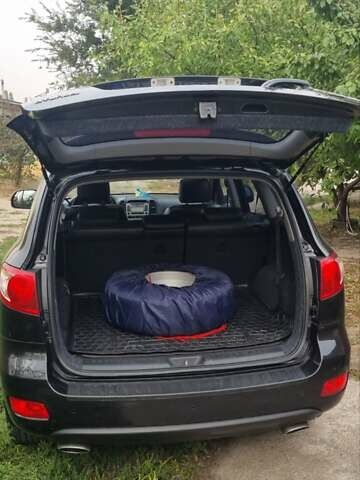 Черный Хендай Санта Фе, объемом двигателя 2.66 л и пробегом 141 тыс. км за 10600 $, фото 3 на Automoto.ua