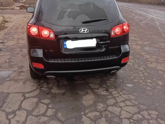 Черный Хендай Санта Фе, объемом двигателя 3.3 л и пробегом 238 тыс. км за 9000 $, фото 1 на Automoto.ua