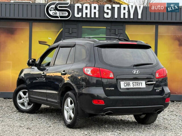 Черный Хендай Санта Фе, объемом двигателя 2.2 л и пробегом 159 тыс. км за 11300 $, фото 3 на Automoto.ua