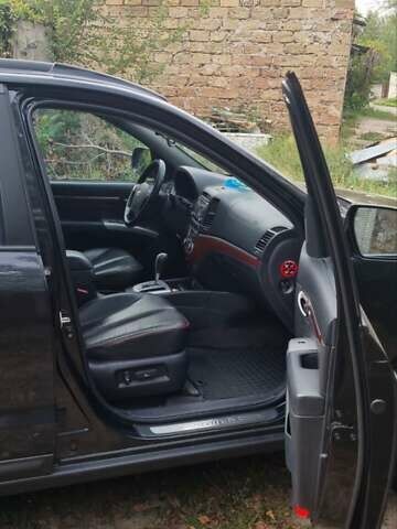 Черный Хендай Санта Фе, объемом двигателя 2.66 л и пробегом 141 тыс. км за 10600 $, фото 6 на Automoto.ua