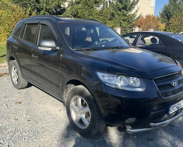 Чорний Хендай Санта Фе, об'ємом двигуна 2.19 л та пробігом 159 тис. км за 11300 $, фото 2 на Automoto.ua