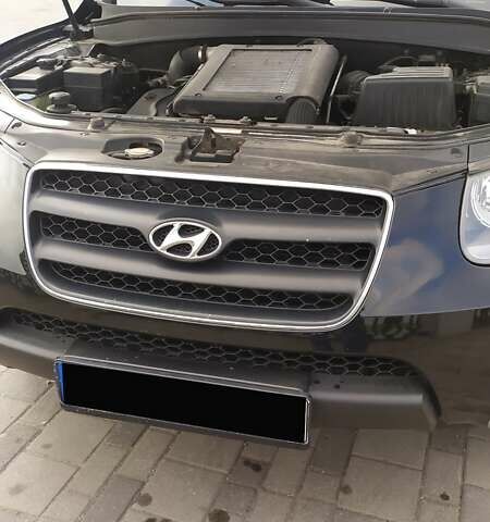 Черный Хендай Санта Фе, объемом двигателя 2.19 л и пробегом 208 тыс. км за 9200 $, фото 6 на Automoto.ua