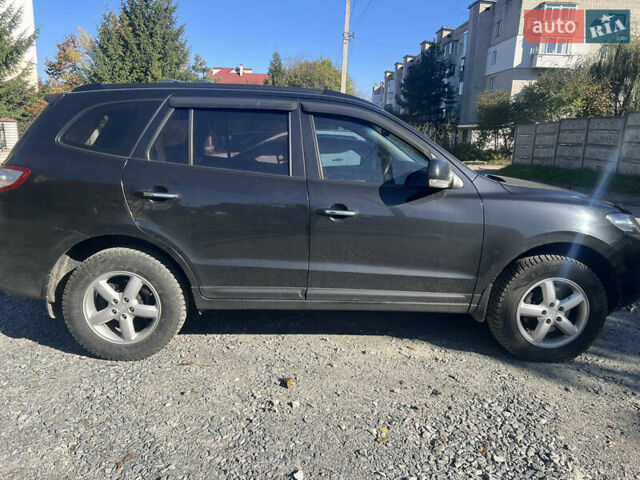Чорний Хендай Санта Фе, об'ємом двигуна 2.19 л та пробігом 159 тис. км за 11300 $, фото 3 на Automoto.ua