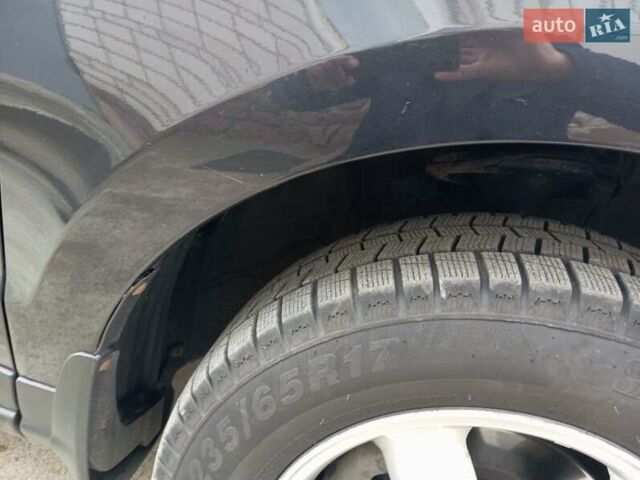 Черный Хендай Санта Фе, объемом двигателя 2.19 л и пробегом 263 тыс. км за 11200 $, фото 5 на Automoto.ua