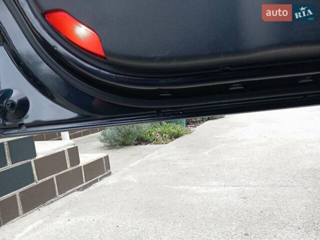 Черный Хендай Санта Фе, объемом двигателя 2.19 л и пробегом 263 тыс. км за 11200 $, фото 3 на Automoto.ua