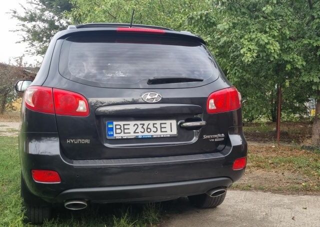 Черный Хендай Санта Фе, объемом двигателя 2.7 л и пробегом 141 тыс. км за 10600 $, фото 3 на Automoto.ua