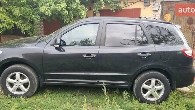 Черный Хендай Санта Фе, объемом двигателя 2.66 л и пробегом 141 тыс. км за 10600 $, фото 4 на Automoto.ua