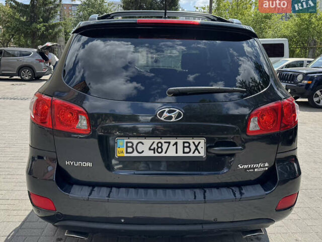 Черный Хендай Санта Фе, объемом двигателя 2.66 л и пробегом 323 тыс. км за 9500 $, фото 4 на Automoto.ua