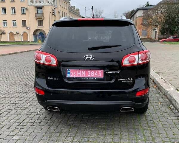 Черный Хендай Санта Фе, объемом двигателя 2.2 л и пробегом 232 тыс. км за 13100 $, фото 4 на Automoto.ua
