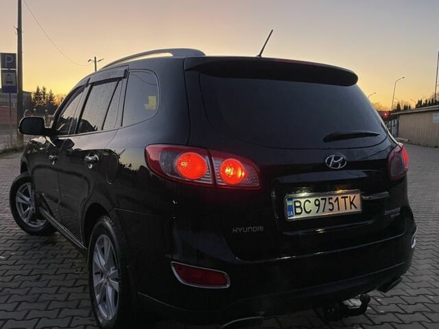 Чорний Хендай Санта Фе, об'ємом двигуна 2.4 л та пробігом 255 тис. км за 9600 $, фото 4 на Automoto.ua