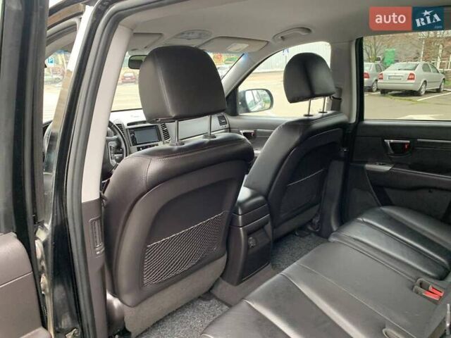 Черный Хендай Санта Фе, объемом двигателя 2.2 л и пробегом 232 тыс. км за 13100 $, фото 20 на Automoto.ua