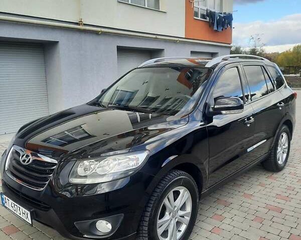 Черный Хендай Санта Фе, объемом двигателя 2.2 л и пробегом 288 тыс. км за 14100 $, фото 1 на Automoto.ua
