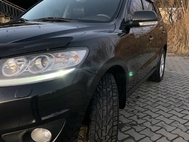 Чорний Хендай Санта Фе, об'ємом двигуна 2.4 л та пробігом 255 тис. км за 9600 $, фото 2 на Automoto.ua