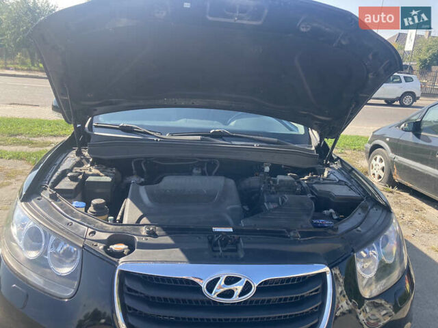 Черный Хендай Санта Фе, объемом двигателя 2.2 л и пробегом 230 тыс. км за 12350 $, фото 12 на Automoto.ua
