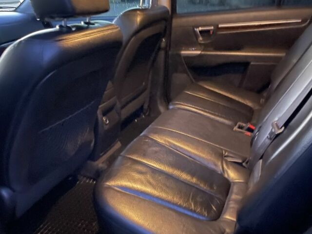 Чорний Хендай Санта Фе, об'ємом двигуна 2.4 л та пробігом 255 тис. км за 9600 $, фото 5 на Automoto.ua