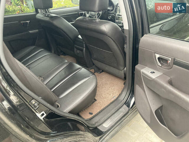 Черный Хендай Санта Фе, объемом двигателя 2.2 л и пробегом 230 тыс. км за 12350 $, фото 43 на Automoto.ua