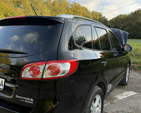 Черный Хендай Санта Фе, объемом двигателя 2.2 л и пробегом 257 тыс. км за 12300 $, фото 9 на Automoto.ua