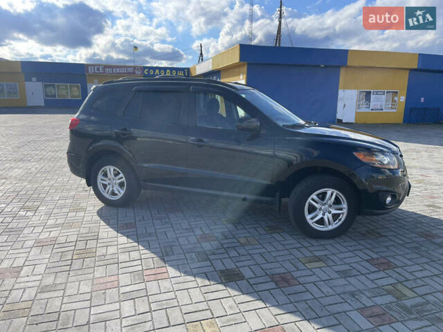 Чорний Хендай Санта Фе, об'ємом двигуна 2.4 л та пробігом 260 тис. км за 9999 $, фото 1 на Automoto.ua