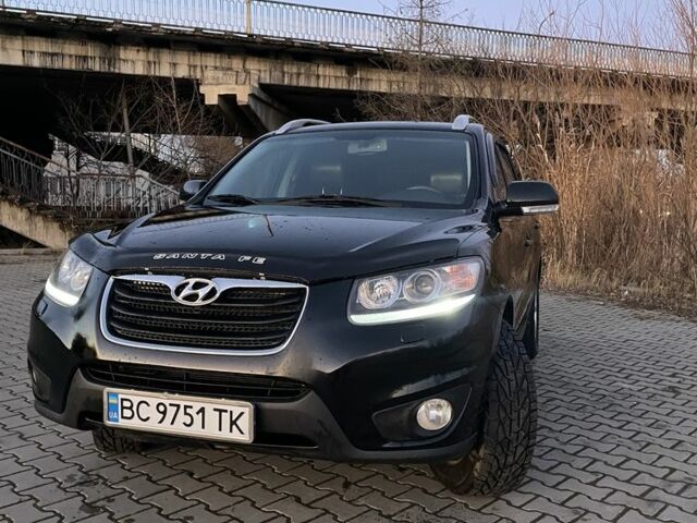 Чорний Хендай Санта Фе, об'ємом двигуна 2.4 л та пробігом 255 тис. км за 9600 $, фото 1 на Automoto.ua