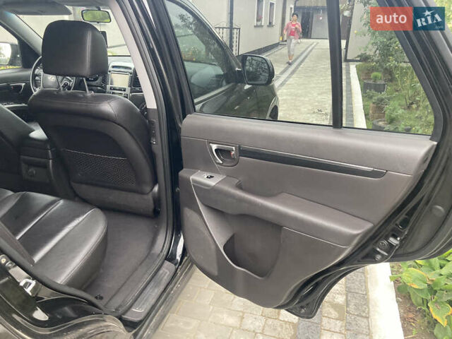 Черный Хендай Санта Фе, объемом двигателя 2.2 л и пробегом 230 тыс. км за 12350 $, фото 42 на Automoto.ua