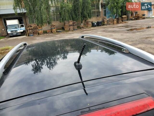 Черный Хендай Санта Фе, объемом двигателя 2.2 л и пробегом 203 тыс. км за 11800 $, фото 12 на Automoto.ua