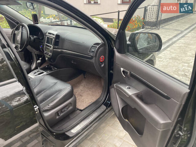 Черный Хендай Санта Фе, объемом двигателя 2.2 л и пробегом 230 тыс. км за 12350 $, фото 24 на Automoto.ua