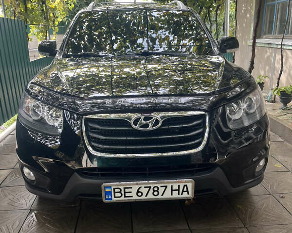 Черный Хендай Санта Фе, объемом двигателя 2.2 л и пробегом 226 тыс. км за 13600 $, фото 1 на Automoto.ua