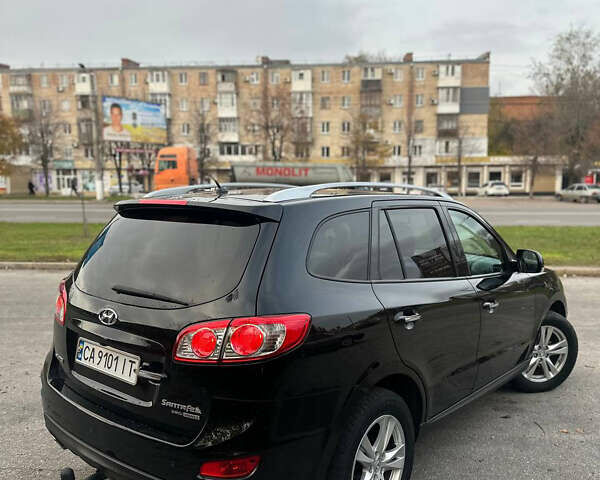 Черный Хендай Санта Фе, объемом двигателя 2.2 л и пробегом 229 тыс. км за 12499 $, фото 2 на Automoto.ua