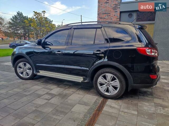 Чорний Хендай Санта Фе, об'ємом двигуна 2.36 л та пробігом 131 тис. км за 12600 $, фото 28 на Automoto.ua