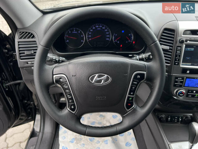 Хендай Санта Фе 2011 в Нововолынск на Automoto.ua Черный Хендай Санта Фе, объемом двигателя 1.97 л и пробегом 214 тыс. км за 13490 $, фото 16 на Automoto.ua
