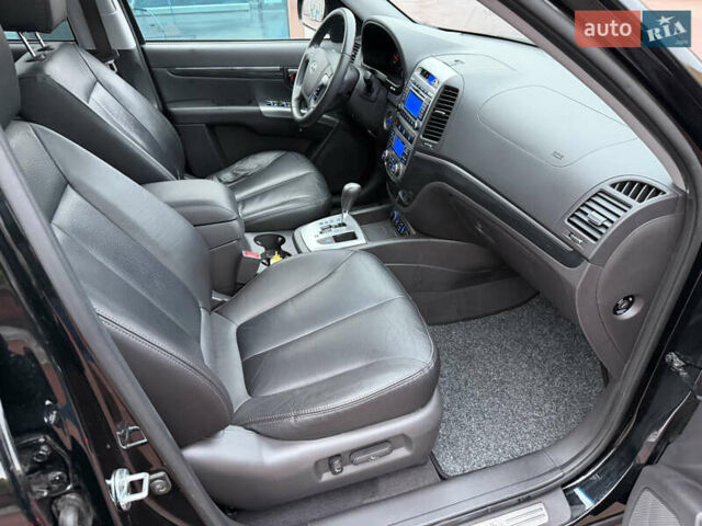 Черный Хендай Санта Фе, объемом двигателя 2.2 л и пробегом 170 тыс. км за 13900 $, фото 79 на Automoto.ua