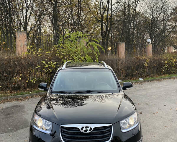 Черный Хендай Санта Фе, объемом двигателя 2.2 л и пробегом 229 тыс. км за 12499 $, фото 1 на Automoto.ua