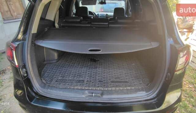 Чорний Хендай Санта Фе, об'ємом двигуна 2 л та пробігом 265 тис. км за 11200 $, фото 1 на Automoto.ua