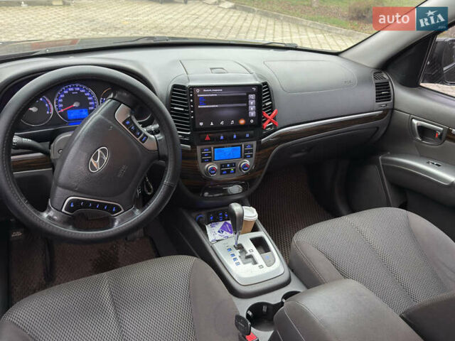 Чорний Хендай Санта Фе, об'ємом двигуна 2.2 л та пробігом 208 тис. км за 11950 $, фото 12 на Automoto.ua