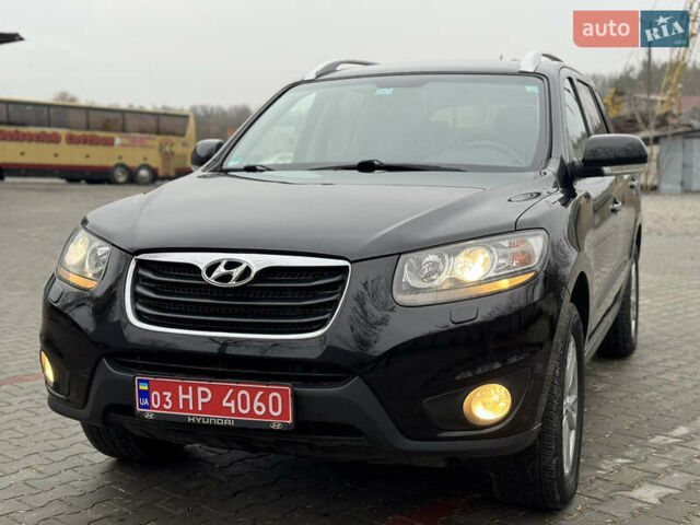 Черный Хендай Санта Фе, объемом двигателя 2.2 л и пробегом 219 тыс. км за 13950 $, фото 1 на Automoto.ua