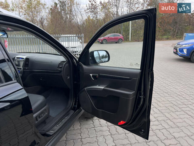 Хендай Санта Фе 2011 в Нововолынск на Automoto.ua Черный Хендай Санта Фе, объемом двигателя 1.97 л и пробегом 214 тыс. км за 13490 $, фото 27 на Automoto.ua