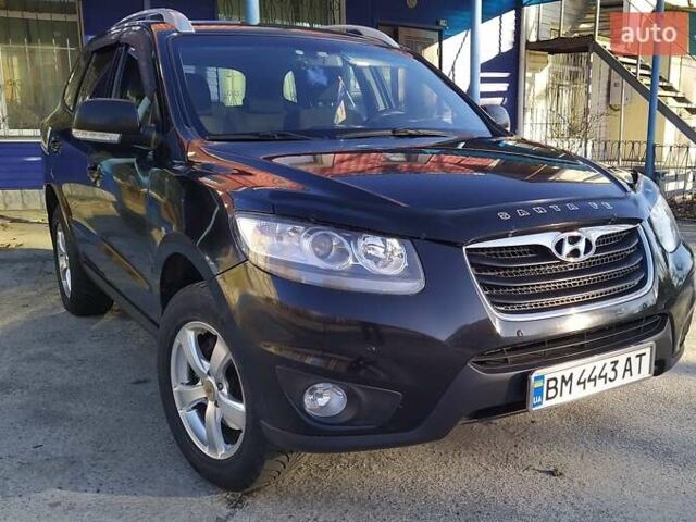 Черный Хендай Санта Фе, объемом двигателя 2.4 л и пробегом 195 тыс. км за 11250 $, фото 2 на Automoto.ua