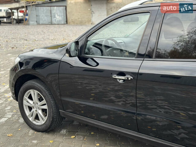 Черный Хендай Санта Фе, объемом двигателя 2.2 л и пробегом 218 тыс. км за 13900 $, фото 12 на Automoto.ua